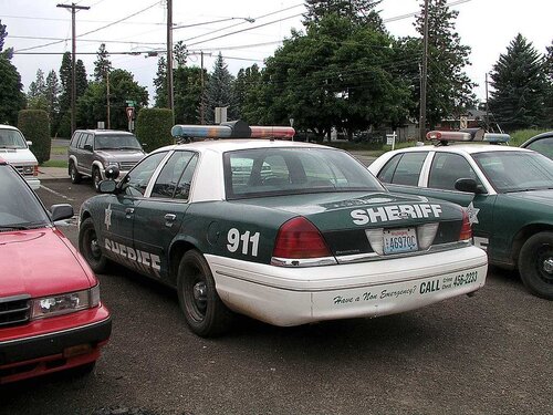 Could contain: vehicle, land vehicle, text, outdoor, wheel, vehicle registration plate, car, transport, sedan, tire, full-size car, automotive exterior, automotive parking light, auto part, family car, parking, motor vehicle, bumper, parking lot, mid-size car, hardtop, vehicle door, automotive tail & brake light, parked, police