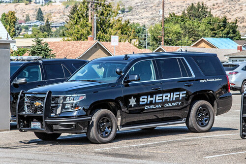 Could contain: vehicle, land vehicle, wheel, outdoor, transport, tire, sport utility vehicle, car, text, bumper, auto part, police, roof rack, law enforcement, full-size car, grille, hardtop, vehicle registration plate, parked