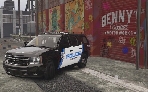 Could contain: text, vehicle, land vehicle, wheel, tire, vehicle registration plate, outdoor, building, bumper, grille, auto part, car, van, sport utility vehicle, ground, police, parked, street