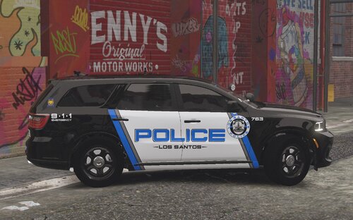 Could contain: text, vehicle, land vehicle, wheel, tire, transport, police car, car, auto part, full-size car, building, police, outdoor, mid-size car, vehicle registration plate, law enforcement, van, street