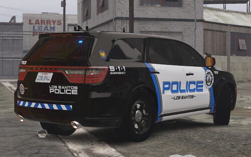 Could contain: text, land vehicle, vehicle, wheel, tire, outdoor, vehicle registration plate, auto part, bumper, police car, transport, automotive exterior, building, sport utility vehicle, law enforcement, ford, full-size car, car, motor vehicle, automotive tail & brake light, automotive tire, rim, fender, compact sport utility vehicle, automotive light bulb, mitsubishi, road, street, police