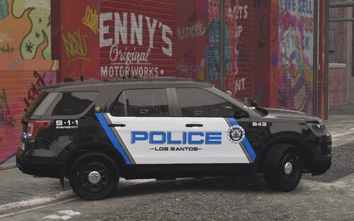 Could contain: text, vehicle, land vehicle, wheel, tire, transport, outdoor, auto part, building, automotive exterior, police car, motor vehicle, van, car, parked, street, police