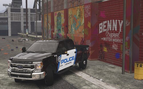 Could contain: text, vehicle, land vehicle, tire, wheel, building, vehicle registration plate, outdoor, car, bumper, road, van, auto part, ground, parked, street, painted, truck