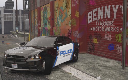 Could contain: text, vehicle, land vehicle, car, wheel, outdoor, building, tire, automotive design, sports car, vehicle registration plate, mid-size car, sports sedan, performance car, ground, street, parked, painted