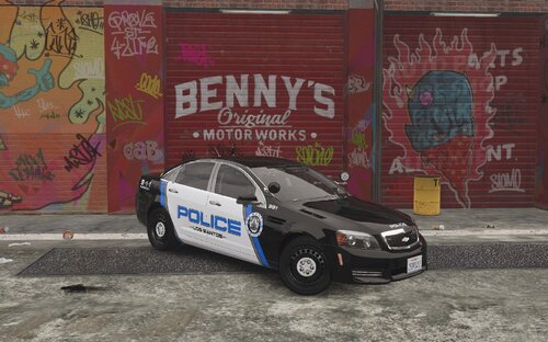 Could contain: vehicle, text, land vehicle, wheel, tire, transport, building, outdoor, mid-size car, car, ground, parked, van, graffiti