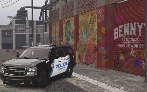 Could contain: text, vehicle, land vehicle, car, wheel, outdoor, tire, building, vehicle registration plate, van, bumper, road, grille, mid-size car, street, parked, ground