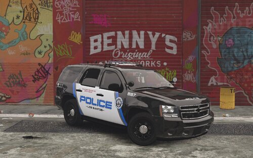 Could contain: vehicle, text, land vehicle, tire, wheel, van, transport, outdoor, auto part, building, bumper, vehicle registration plate, motor vehicle, car, parked, graffiti, ground, truck, police