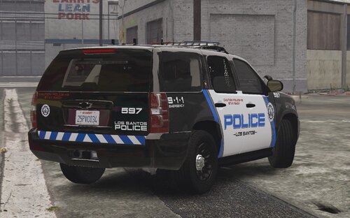 Could contain: text, vehicle, land vehicle, wheel, tire, outdoor, transport, vehicle registration plate, auto part, automotive exterior, motor vehicle, police car, car, sport utility vehicle, law enforcement, ford, automotive luggage rack, roof rack, police, van, street, parked