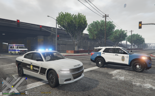 Could contain: vehicle, land vehicle, outdoor, wheel, sky, tire, transport, road, auto part, ground, car, street, light