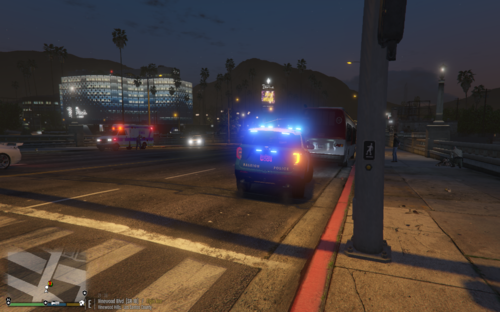 Could contain: vehicle, outdoor, land vehicle, sky, car, road, electricity, street, light, street light, transport, ground, city, night