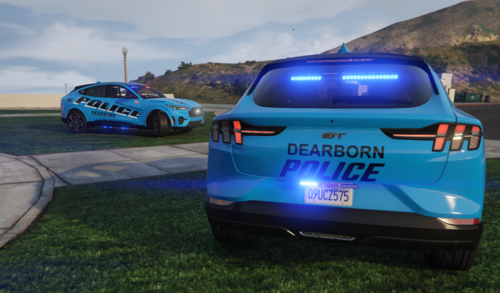 Could contain: vehicle, land vehicle, outdoor, wheel, sky, text, grass, transport, blue, automotive exterior, tire, bumper, automotive design, motor vehicle, auto part, automotive light bulb, hood, sports car, mode of transport, road, car, mountain