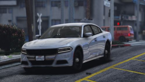 Could contain: land vehicle, vehicle, wheel, outdoor, road, tire, building, auto part, mid-size car, bumper, automotive design, street, car, ground, parked