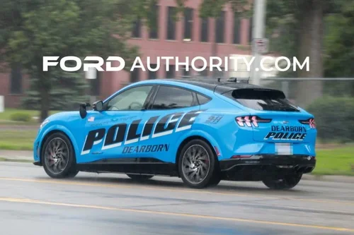 Could contain: vehicle, land vehicle, wheel, transport, car, outdoor, automotive design, tire, road, sports car, auto part, blue, street