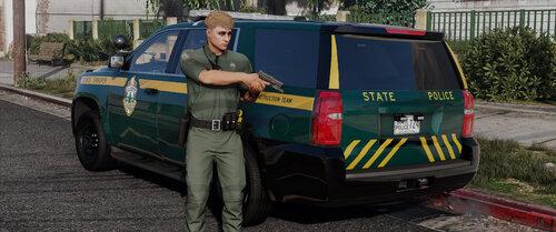 Could contain: vehicle, outdoor, land vehicle, wheel, clothing, person, text, van, car, vehicle registration plate, law enforcement, transport, tire, emergency service, police, automotive exterior, ground, street