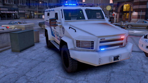 Could contain: vehicle, land vehicle, wheel, tire, transport, truck, car, building, outdoor, bumper, emergency vehicle, auto part, emergency service, ground, police, parked