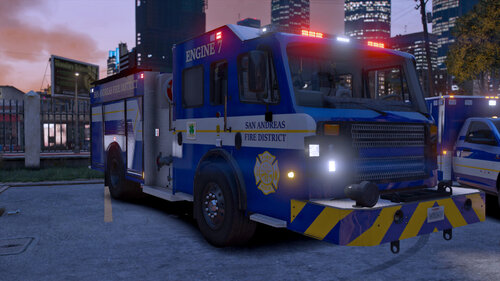 Could contain: transport, vehicle, land vehicle, wheel, outdoor, sky, emergency service, emergency vehicle, building, firefighter, emergency, tire, road, mode of transport, parked, truck, street, light, blue, city, ground, fire