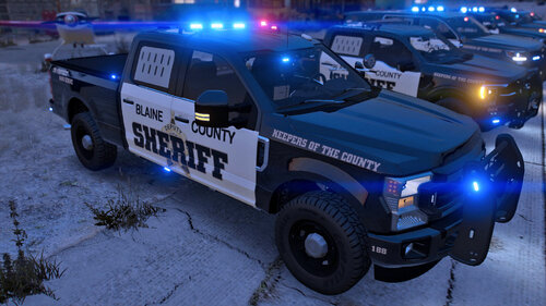 Could contain: vehicle, tire, wheel, land vehicle, transport, outdoor, auto part, automotive tire, off-road vehicle, bumper, automotive exterior, snow, tread, text, winter, street, ground, car, police