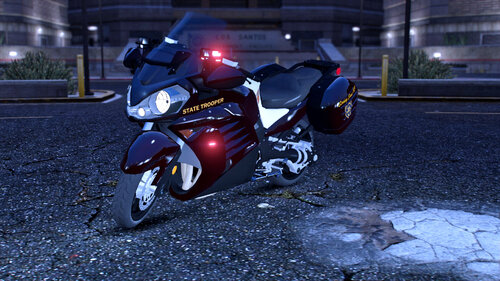 Could contain: vehicle, outdoor, tire, wheel, ground, land vehicle, auto part, road, motorbike, motorcycle fairing, motorcycle, automotive lighting, motorcycling, fuel tank, street, night, parked, light, bike