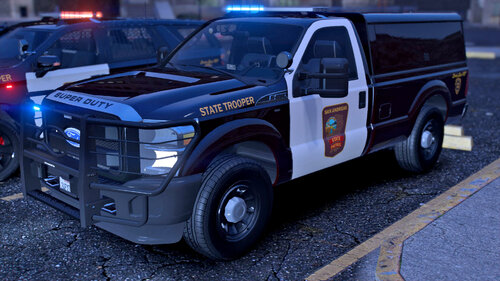 Could contain: vehicle, land vehicle, wheel, tire, transport, outdoor, auto part, bumper, road, motor vehicle, police, automotive exterior, automotive tire, truck, sport utility vehicle, fender, pickup truck, ford, emergency service, vehicle registration plate, emergency vehicle, street, parked, car, ground