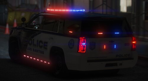 Could contain: vehicle, land vehicle, text, car, wheel, road, vehicle registration plate, outdoor, automotive tail & brake light, police car, automotive lighting, automotive exterior, transport, automotive light bulb, auto part, law enforcement, emergency service, emergency vehicle, light, police, street, night, driving