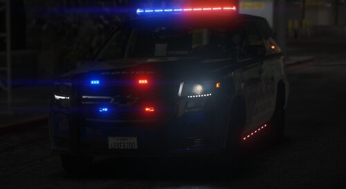 Could contain: vehicle, land vehicle, text, wheel, automotive lighting, vehicle registration plate, automotive tail & brake light, tire, outdoor, auto part, automotive light bulb, road, full-size car, mid-size car, bumper, light, automotive exterior, automotive side marker light, police, street, car, night