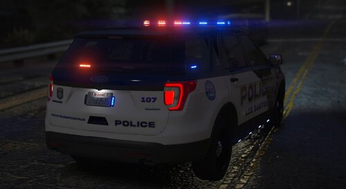 Could contain: vehicle, land vehicle, text, wheel, outdoor, vehicle registration plate, tire, police car, auto part, automotive lighting, automotive exterior, law enforcement, automotive tail & brake light, road, car, transport, bumper, ford, sport utility vehicle, emergency service, automotive light bulb, emergency vehicle, light, police, street, night