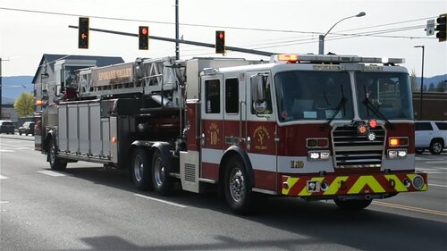 Could contain: vehicle, transport, land vehicle, outdoor, wheel, road, emergency service, truck, emergency vehicle, fire department, fire apparatus, fire, emergency, auto part, mode of transport, firefighter, commercial vehicle, rescue, sky, service, street, public utility, motor vehicle, tire, fire station, driving, department, parked