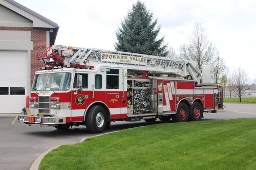 Could contain: fire, outdoor, transport, vehicle, wheel, land vehicle, fire department, fire apparatus, emergency service, firefighter, emergency vehicle, grass, truck, tree, emergency, fire station, rescue, department, red, road, parked, engine