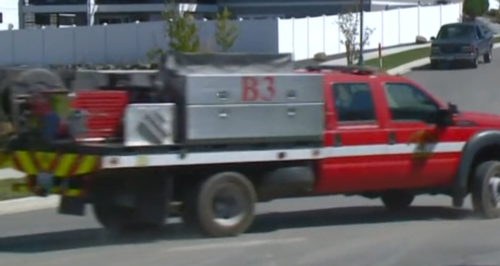 Could contain: vehicle, wheel, transport, land vehicle, outdoor, truck, tire, auto part, emergency service, road, motor vehicle, emergency vehicle, text, emergency, mode of transport, tow truck, trailer truck, pickup truck, vehicle registration plate, commercial vehicle, fire, street