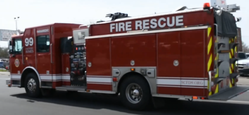 Could contain: fire, vehicle, transport, land vehicle, wheel, emergency service, emergency vehicle, outdoor, fire department, fire apparatus, emergency, firefighter, truck, department, service, rescue, auto part, fire station, mode of transport, road, text, parked, red, engine, street