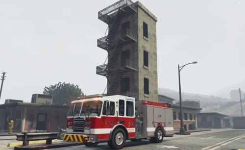 Could contain: sky, outdoor, vehicle, land vehicle, wheel, road, firefighter, building, transport, fire department, fire apparatus, public utility, emergency service, street, fire, truck, red