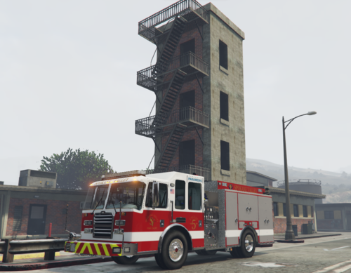 Could contain: sky, outdoor, vehicle, land vehicle, wheel, building, road, transport, firefighter, fire department, emergency service, fire apparatus, emergency vehicle, fire, street, red, truck, driving, tower