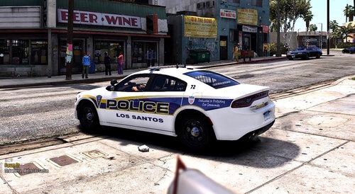 Could contain: text, land vehicle, vehicle, wheel, outdoor, transport, car, full-size car, mid-size car, police car, police, sports sedan, vehicle registration plate, tire, auto part, road, law enforcement, street, ground, city