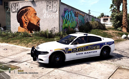 Could contain: vehicle, text, land vehicle, wheel, outdoor, transport, car, tire, police car, full-size car, ground, police