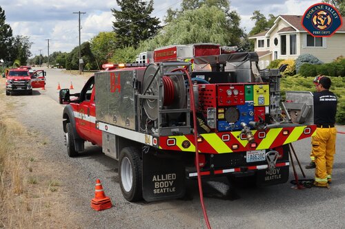 Could contain: outdoor, wheel, vehicle, land vehicle, firefighter, fire, text, transport, sky, tire, emergency service, auto part, fire department, tree, emergency vehicle, truck, emergency, fire apparatus, car, road, rescue, vehicle registration plate, motor vehicle, ground, parked, red