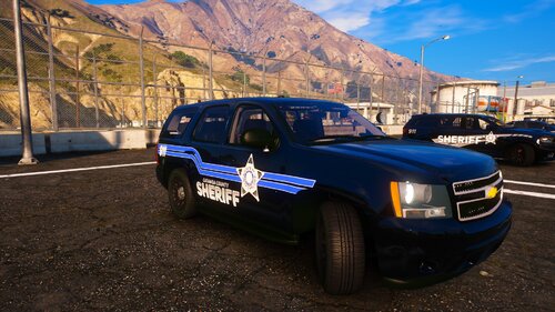 Could contain: outdoor, vehicle, land vehicle, sky, wheel, tire, ground, mountain, bumper, automotive exterior, auto part, sport utility vehicle, parked, transport, road, blue, car