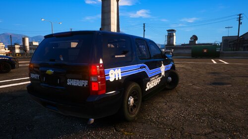 Could contain: vehicle, sky, land vehicle, outdoor, wheel, text, tire, transport, vehicle registration plate, road, auto part, automotive exterior, police car, automotive tail & brake light, law enforcement, motor vehicle, police, sport utility vehicle, full-size car, street, parked, car, van