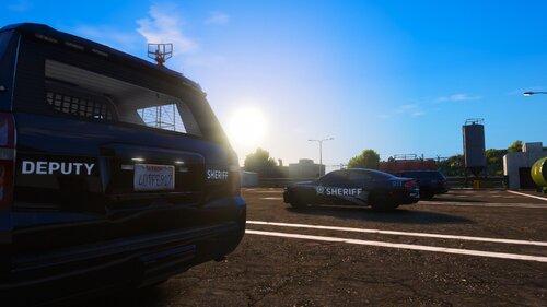 Could contain: sky, outdoor, land vehicle, text, vehicle, vehicle registration plate, wheel, road, ground, car, van, sun, street, parked, light