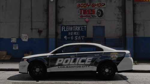 Could contain: vehicle, wheel, land vehicle, text, transport, building, road, outdoor, tire, full-size car, auto part, mid-size car, sedan, car, street, parked, police