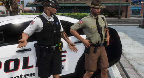 Could contain: clothing, person, outdoor, man, vehicle, hat, law enforcement, police, police officer, fashion accessory, security, land vehicle, officer, wearing, people