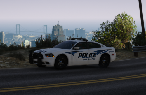 Could contain: vehicle, land vehicle, transport, outdoor, sky, wheel, police, sports sedan, car, full-size car, police car, mid-size car, sports car, performance car, automotive design, road