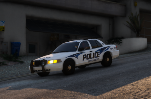 Could contain: vehicle, land vehicle, wheel, transport, car, outdoor, tire, police car, full-size car, ford crown victoria police interceptor, sedan, road, law enforcement, motorsport, street, police