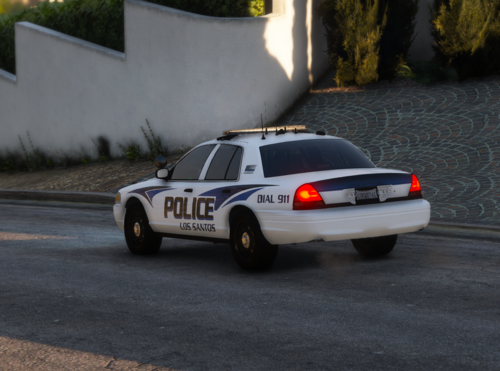 Could contain: vehicle, land vehicle, wheel, outdoor, transport, tire, ford crown victoria police interceptor, road, police car, car, full-size car, vehicle registration plate, text, law enforcement, police, sedan, street