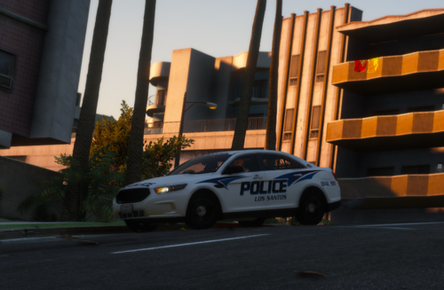 Could contain: vehicle, land vehicle, outdoor, wheel, sky, car, transport, building, road, police car, mid-size car, tire, street, police