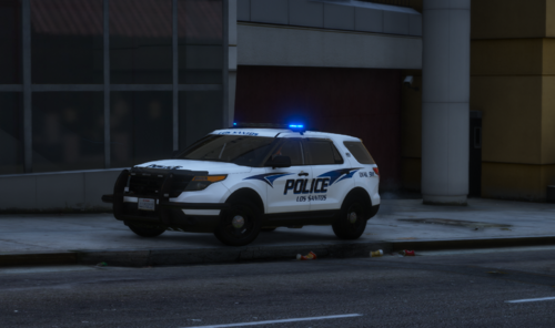 Could contain: vehicle, land vehicle, wheel, transport, police car, tire, law enforcement, outdoor, emergency service, emergency vehicle, building, ford, police van, road, street, car, police, light, emergency