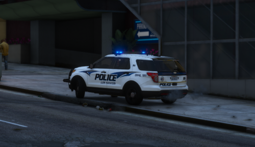 Could contain: vehicle, land vehicle, wheel, text, transport, police car, emergency service, law enforcement, emergency vehicle, outdoor, building, road, tire, emergency, vehicle registration plate, street, police van, auto part, full-size car, police, car, light