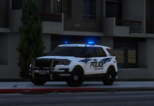 Could contain: vehicle, land vehicle, wheel, transport, police car, law enforcement, outdoor, building, emergency vehicle, sport utility vehicle, emergency service, tire, text, police van, ford, automotive exterior, compact sport utility vehicle, road, car, street, police, light