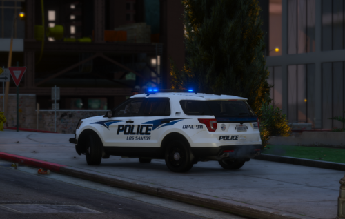 Could contain: vehicle, land vehicle, wheel, transport, outdoor, text, road, law enforcement, building, police car, emergency vehicle, emergency service, street, police van, police, car