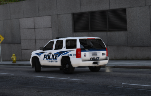 Could contain: vehicle, land vehicle, wheel, transport, outdoor, tire, text, road, police car, law enforcement, vehicle registration plate, automotive exterior, auto part, emergency vehicle, emergency service, police van, car, motor vehicle, ford, street, van, police