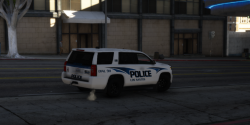 Could contain: vehicle, land vehicle, wheel, tire, outdoor, transport, building, car, police car, law enforcement, road, text, auto part, automotive exterior, sport utility vehicle, police, street, parked